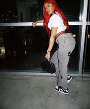 Load image into Gallery viewer, Cross patched Jeans
